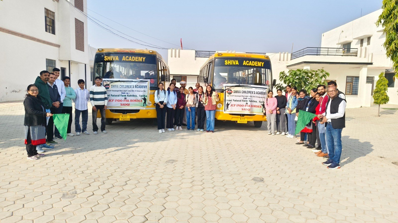 School buses with students and staff